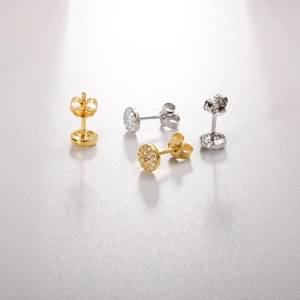 Detailed view of S925 sterling silver pave stud earrings in gold and silver finishes