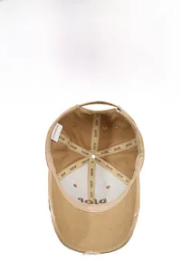 Detail view showing breathable mesh lining and brand embroidery inside the khaki cap