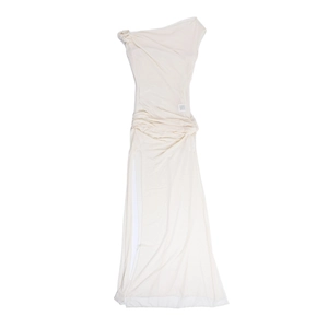 Flat lay detail of cream one-shoulder long dress showing pleated fabric texture