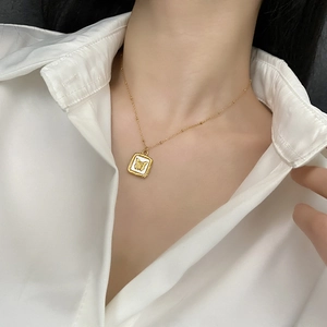 Elegant gold butterfly pendant necklace with white shell inlay for women's jewelry