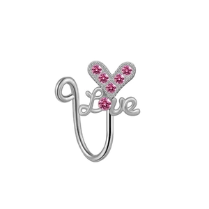 Close-up of silver nose ring with pink rhinestone heart and Love lettering detail