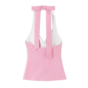 Detailed back view of pink and white gingham halter top with a large bow tie closure