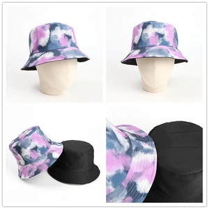 Double-sided tie-dye bucket hat with colorful print and solid black cotton finish