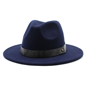 Navy blue wool fedora hat with a grey snakeskin pattern band and gold metallic stud