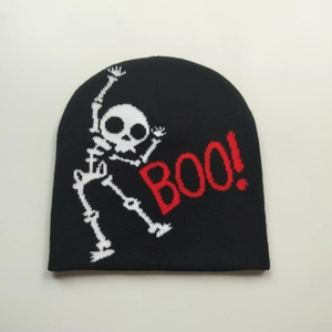 Detailed knit texture of black beanie with white skeleton pattern and red BOO text