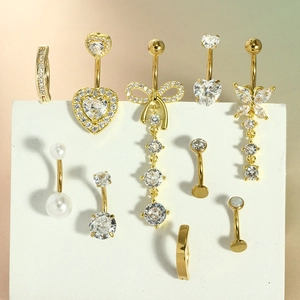 10-piece gold stainless steel navel rings set featuring pink hearts and butterfly designs