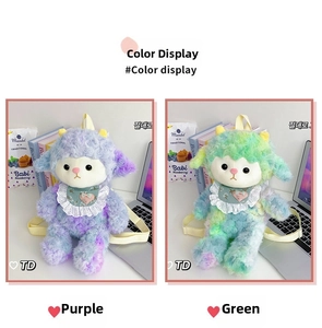 Close-up of curly plush pig backpacks in lavender and mint green with lace details