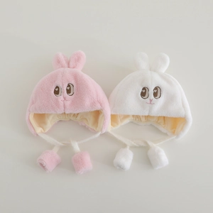 Plush baby winter hat with cute bunny ears and soft fleece lining in pink and white