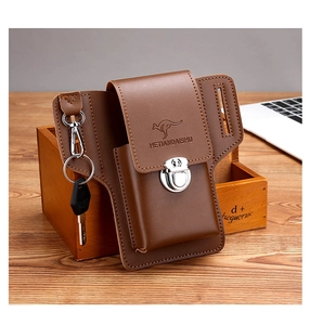 Close-up of brown leather belt phone pouch featuring a metal buckle and key holder