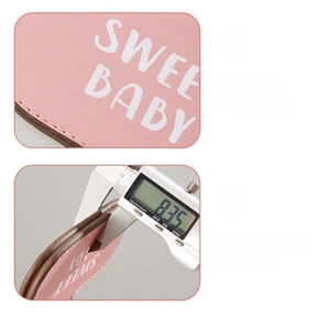 Detail view of pink PU leather hat clip with 8.35mm thickness and sweet baby print