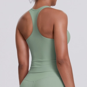 Close-up of racerback design on sage green seamless yoga set with breathable fabric