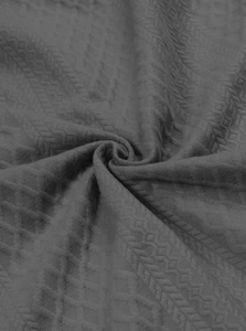 Detailed macro view of the grey jacquard knit fabric showing the waffle texture and softness