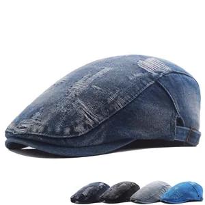 Distressed denim beret with frayed edges and metal buckle in multiple wash colors