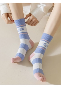 Detail of striped cotton five-finger socks showing a unique separated toe design for yoga