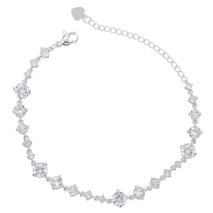 Detail of silver link bracelet featuring lobster clasp and adjustable heart charm chain