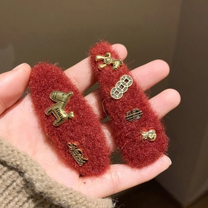 Deep red plush hair clips set with golden horse and money charms for New Year