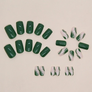 Green wavy marble and solid emerald press-on nails set in medium square shape