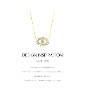 Close-up of S925 silver evil eye necklace with blue gemstone and rectangular crystals