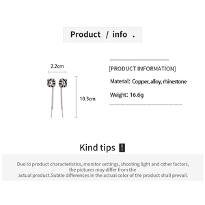 Detail view of geometric square fringe earrings with dimensions 2.2cm wide and 10.3cm long