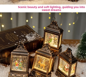 Detailed view of four vintage Christmas lanterns with snowmen and Santa figurines