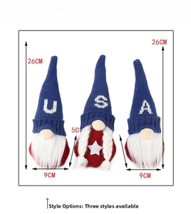Three USA patriotic gnomes with red, white, and blue colors and lettered knit hats