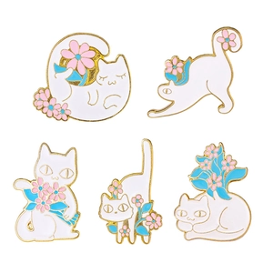 Set of 5 cute cartoon white cat enamel pins with floral accents and gold-plated edges