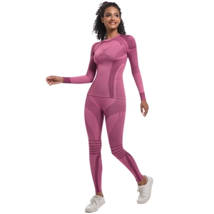 Detailed knit texture and moisture-wicking zones on seamless rose pink yoga set
