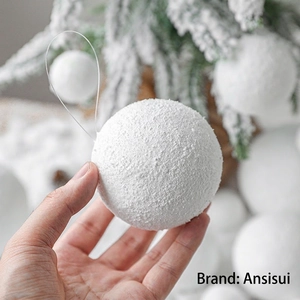 Frosted white foam Christmas ball ornament with snow texture and hanging string