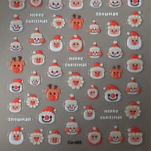 3D embossed Christmas nail art stickers featuring Santa, snowman, and reindeer motifs