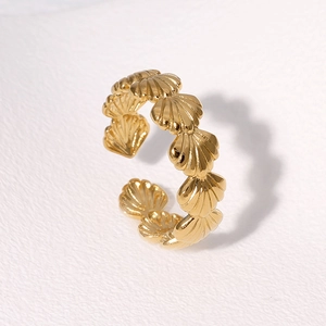 Minimalist gold shell open ring crafted from stainless steel with textured sea design