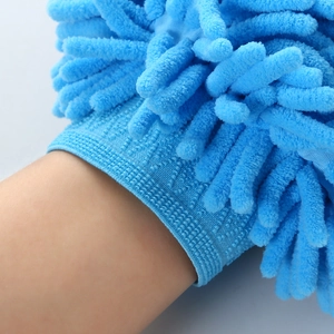Detail of the elastic wrist cuff on a blue chenille microfiber car wash glove