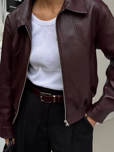 Women's burgundy faux leather jacket with zipper closure for casual holiday outfits