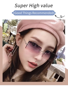 Front view of model wearing rimless rectangle sunglasses with purple gradient lenses