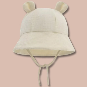 Close-up of baby sun hat with cute 3D bear ears and secure adjustable chin straps