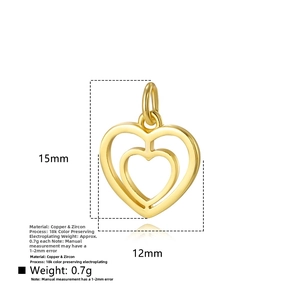 Detailed view of golden double heart pendant with cubic zirconia inlay and 18k gold plating