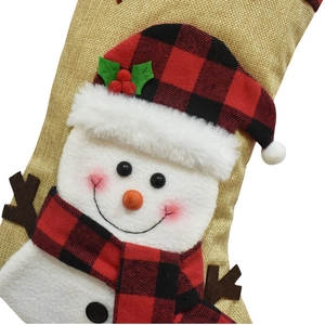Linen Christmas stocking with a 3D snowman featuring a red plaid hat and scarf pattern