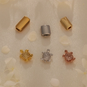 Handmade turtle charms and rectangle sliders for DIY jewelry making in multi-color finishes