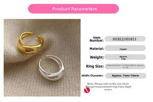 Detail view of gold and silver minimalist cross rings with adjustable open band design