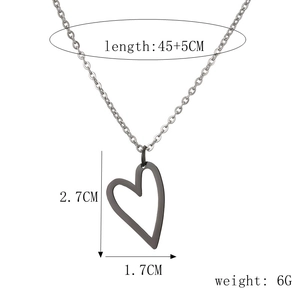 Detailed view of black heart pendant with specific length and weight measurements