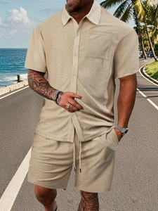 Detail of summer men's waffle texture beige leisure set with drawstring shorts