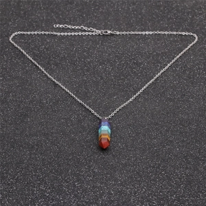 Top view of a hexagonal colorful crystal column pendant on a silver metal chain