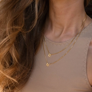 Golden double layer box chain necklace featuring letter B and N alphabet pendants