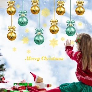 Merry Christmas snowflake window clings featuring gold and green decorative ball stickers