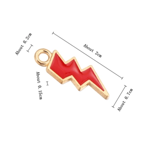 Macro shot of red enamel lightning bolt charm with dimensions 2cm by 0.7cm for DIY jewelry