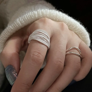Elegant multi-layered silver ring with textured twisted wire design for women