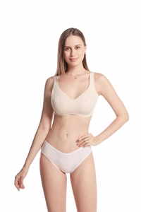 Dettaglio della trama a costine in cotone beige senza cuciture dell'intimo traspirante donna