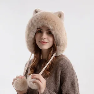 Winter plush knit hat for women with cat ears and fur pom-pom earflaps in cream