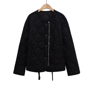 Women's black quilted jacket with round neck and asymmetrical zipper closure
