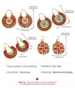 Detailed view of four pairs of vintage zinc alloy earrings with size and weight specs