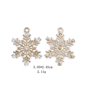 Detailed view of gold snowflake earrings with sparkling rhinestones and measurements